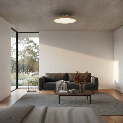 Jubilate ceiling light glossy finish reflecting light in stylish lounge corner