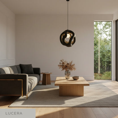 sculptural flame pendant light illuminating cozy dining table with Italian cave inspired ambiance