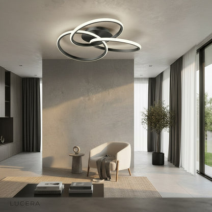 Loom ceiling light glowing softly in nighttime bedroom ambiance