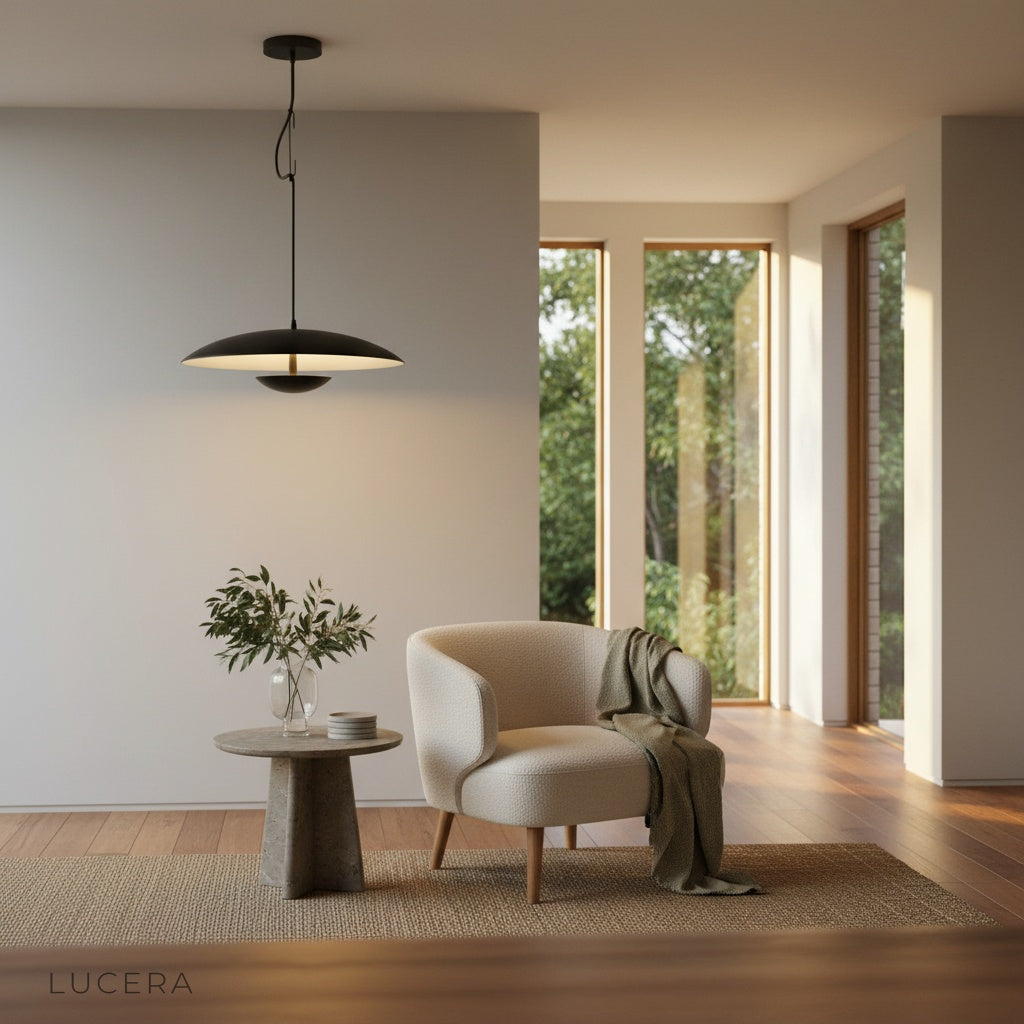 Natural wood finish Cinder Pendant Light centered in a bright studio setting with soft shadows