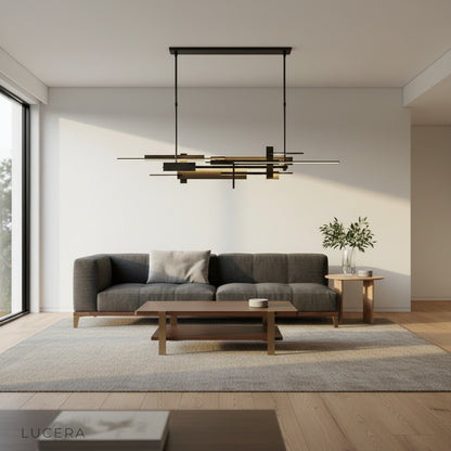 Cassiopeia chandelier lit at dusk in spacious open-plan living area