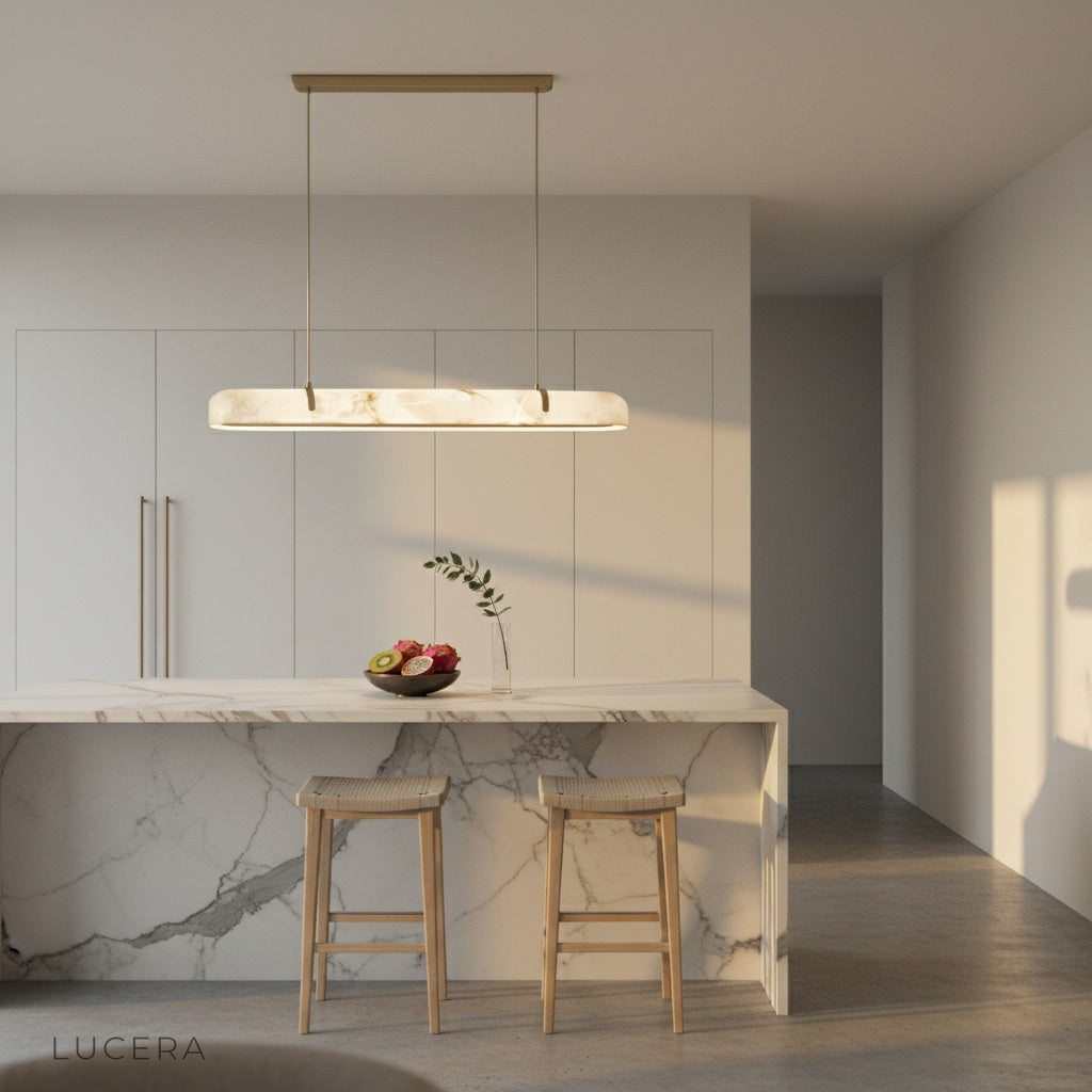 overhead angle of Nerissa chandelier suspended over a minimalist dining table with decor