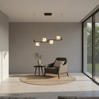 Lodge chandelier illuminating kitchen island with warm light and bar stools