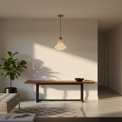 brass Chianti pendant light paired with wooden dining table in cozy modern dining room