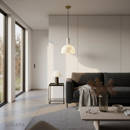 close-up detail of alabaster stone texture and brushed metal hardware on Midas pendant light