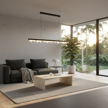 Linear pendant light by Lucera adding architectural interest to a minimalist hallway or entryway