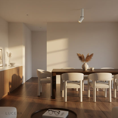 nighttime lifestyle shot of Bewitch ceiling light glowing softly in a modern bedroom