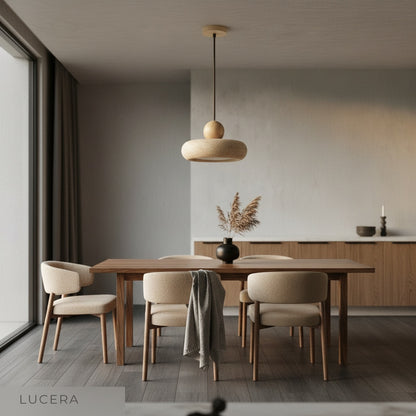 Close-up detail of Mensa Pendant Light travertine surface and wood grain