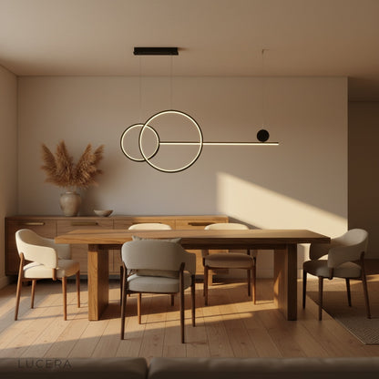 Brumal pendant light in dark room casting warm ambient light on wall