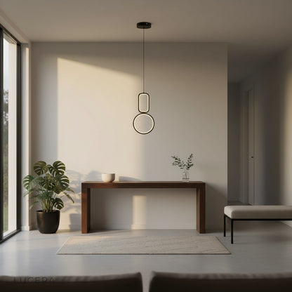 Facade pendant light in white finish above round dining table with chairs