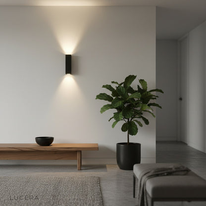 gold wall lamp in matte and polished gold finishes side by side