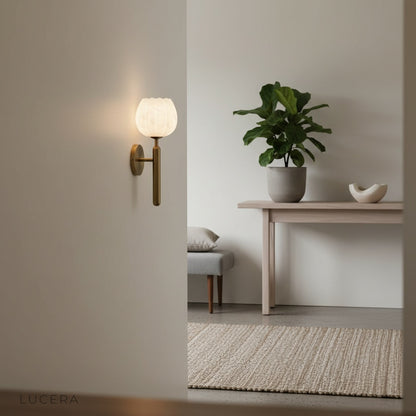 side angle of the Madeira wall lamp highlighting the warm ambient glow and slim profile