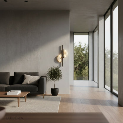 Inception wall lamp side view on neutral background showing metal and stone finish