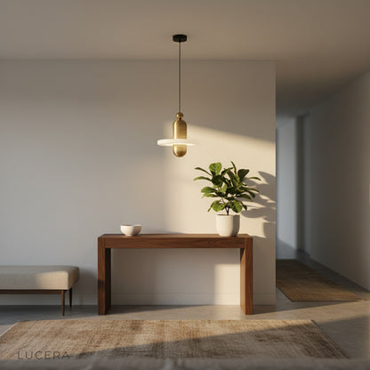 Marianist pendant light above bedside table in elegant hotel-style setting