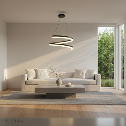 Hypnotize pendant light hanging in cozy reading nook with soft evening shadows