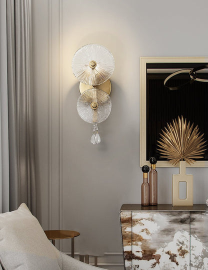 close-up detail of crystal droplets refracting light on premium iron wall lamp