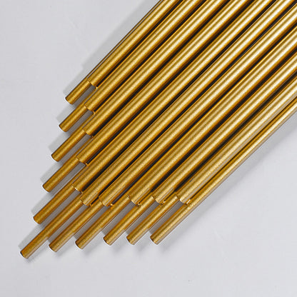 close-up of Leone sconce metal arm and gold finish with fabric shade detail