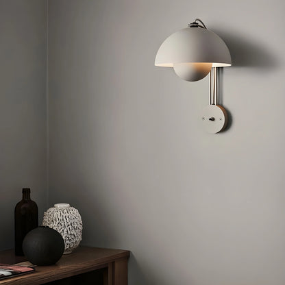 White Coronal Nordic wall lamp mounted on clean neutral studio wall