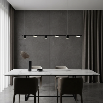 Rind black and gold linear pendant lamp illuminating modern living room