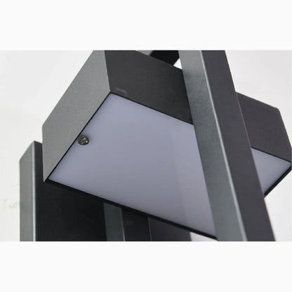 close-up of black acrylic lantern glass and metal frame