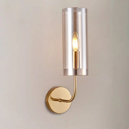 Close-up studio view of Medial wall sconce showing premium iron texture and clear glass bulb cover