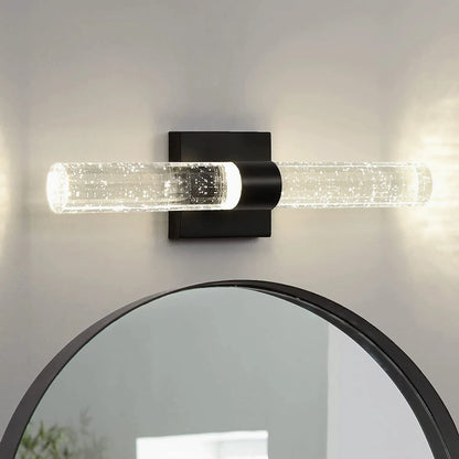 Mezza Bubble Crystal Wall Lamp glowing in a modern living room