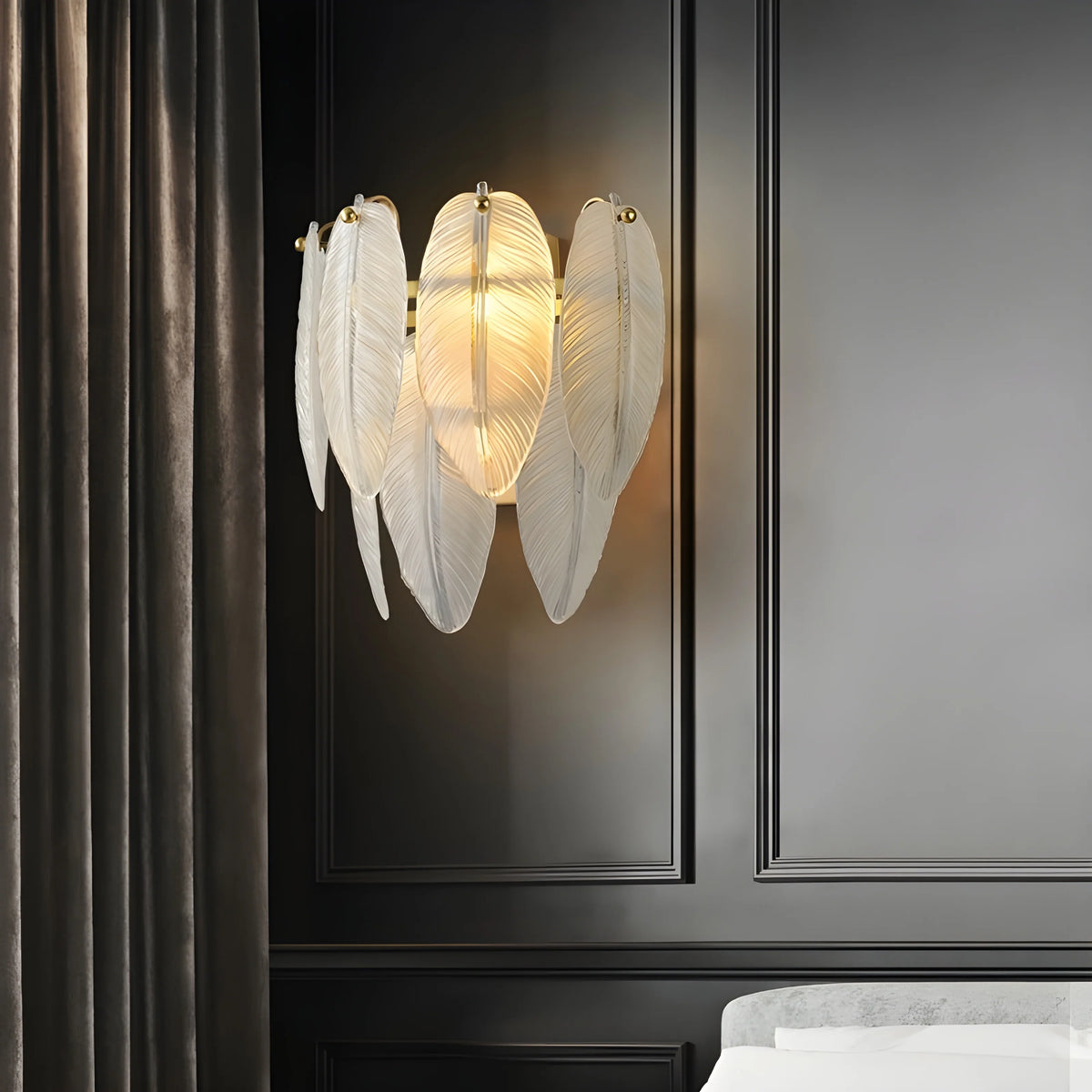 Soli vintage brass chandelier with frosted glass leaves glowing in a modern living room