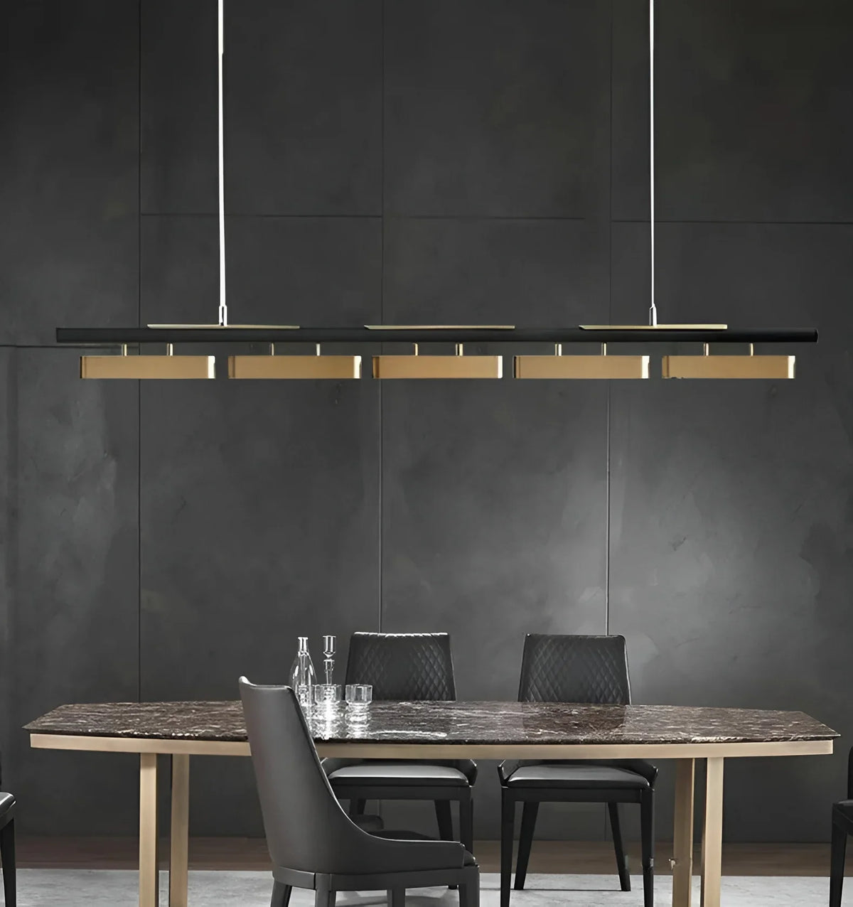 Oskar modern linear LED chandelier illuminating a minimalist dining room with stainless steel blocks