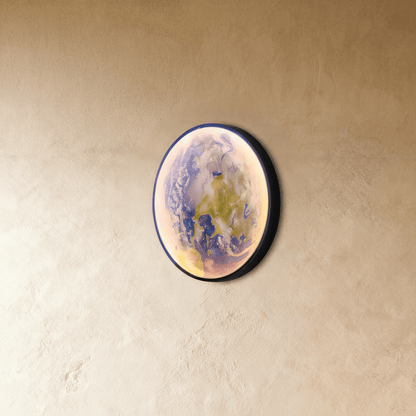 Caspian Moon Wall Lamp close-up of the moon's surface texture and LED edge lighting detail