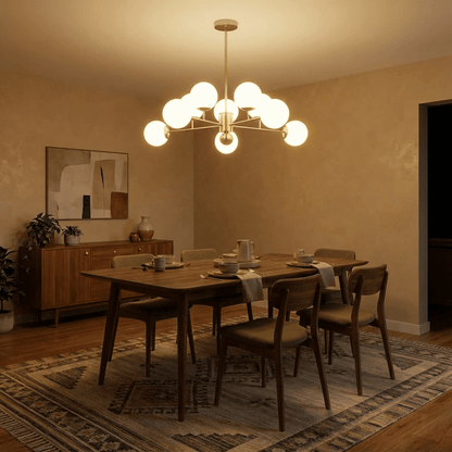 Yett chandelier with LED bulbs lit in bright studio setting, three-quarter angle
