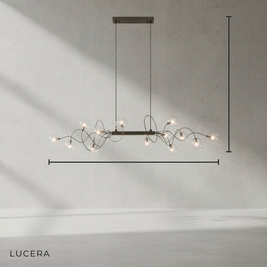 front view of stainless steel chandelier with eight glass globes in clean studio setting