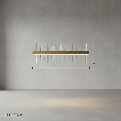 Studio angled view of rectangular stainless steel chandelier with warm gold finish
