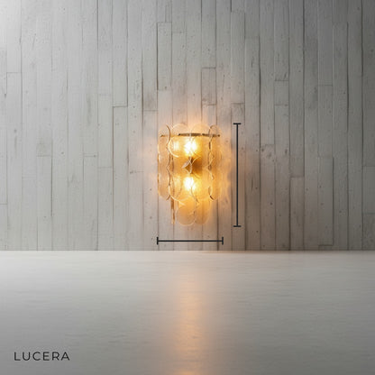 front view of Colmo Caspian wall light on clean white background showing glass panel detail