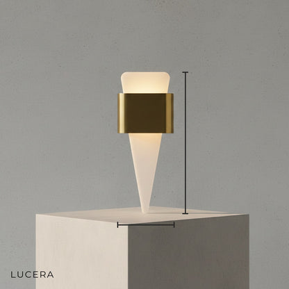 minimalist front view of Lucera Passo LED sconce with acrylic diffuser and sleek shark fin profile