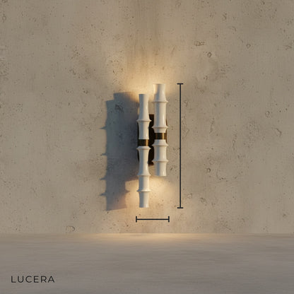 minimalist bamboo LED sconce studio view showing stainless steel frame