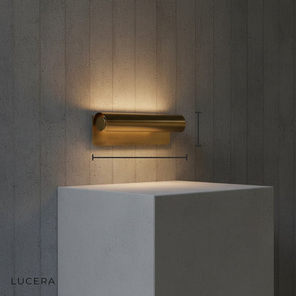 minimalist studio view of handcrafted brass sconce with E14 LED bulb