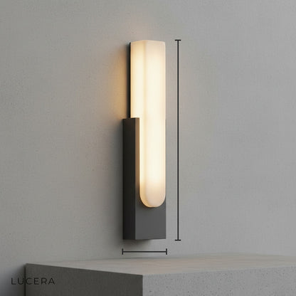 Minimalist wall sconce with genuine marble shade and brushed metal hardware