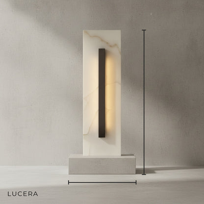 Studio shot of Portico Neo wall lamp front view showing genuine marble and black iron details