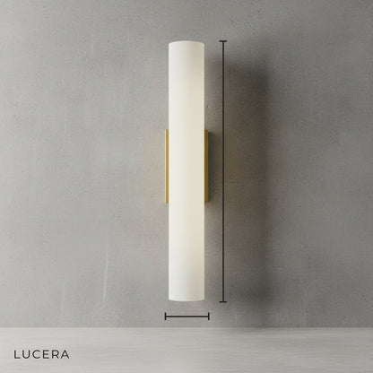 Front view of Lucera Oriental wall lamp showing natural marble texture and sculptural iron design