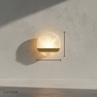 studio view of Ventral V-line wall lamp minimalist silhouette with natural marble details
