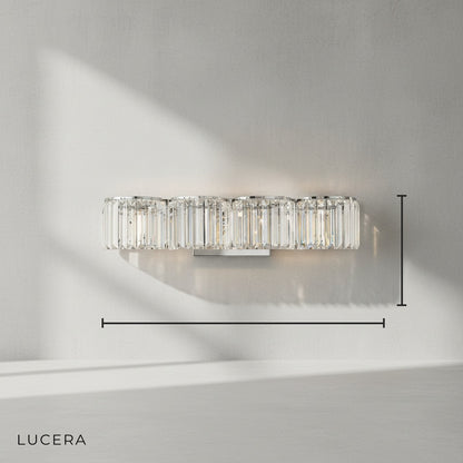 Studio shot of Vibrato crystal wall sconce with clear glass crystals on a clean white background