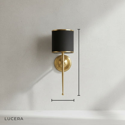 Morendo wall sconce side profile studio view showing sleek silhouette and fabric texture
