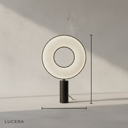Studio view of Brio table lamp showing acrylic diffuser and three color temperature settings