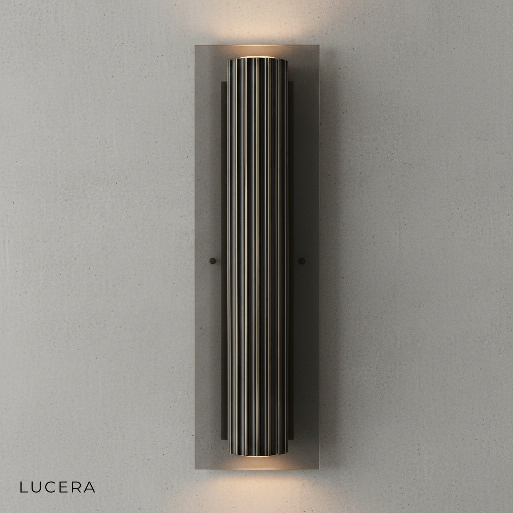 close-up of Loano wall lamp copper accents and black iron shade texture detail