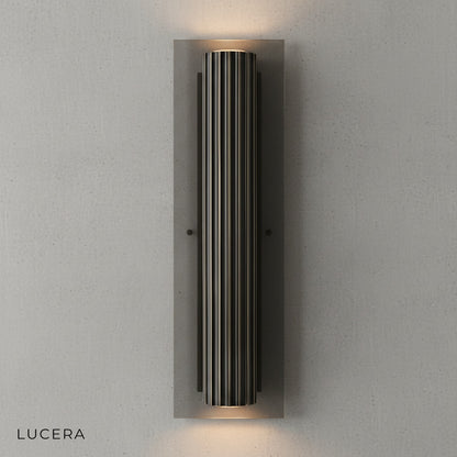 close-up of Loano wall lamp copper accents and black iron shade texture detail