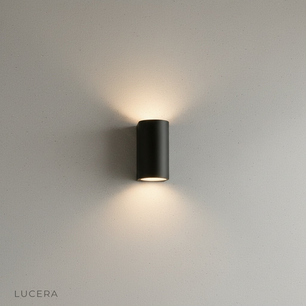 minimalist outdoor wall light with frosted glass panel against white background