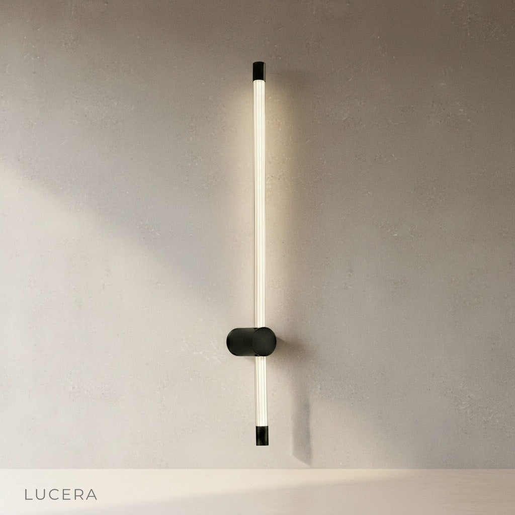 minimalist yoke wall lamp side view showing sleek curved arm and wall mount
