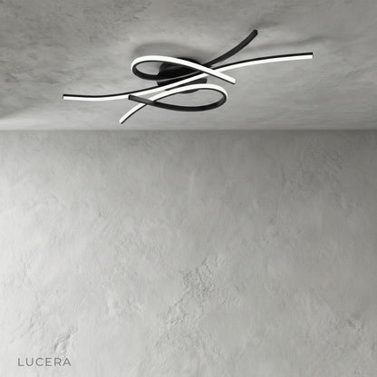 studio shot of Divination ceiling light with intertwining aluminum LED bars