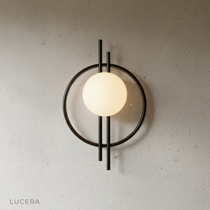 Leander Wall Lamp side profile on clean white background, iron frame