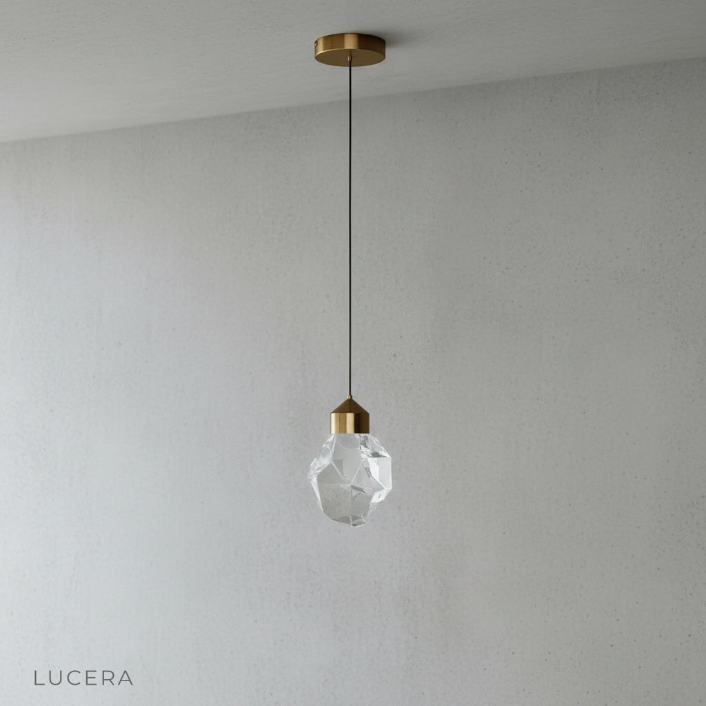 front view of lucera cristal pendant light with adjustable wire in studio setting